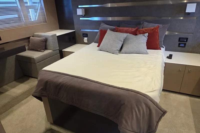 Slide: The Image of Luxurious bedroom interior of 2018 Cruisers Yachts 54 Cantius with modern decor and cozy bedding. - 37