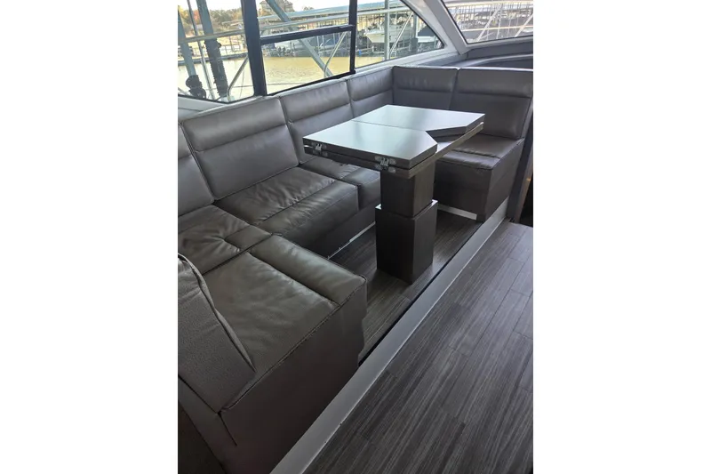 Slide: The Image of Luxurious interior seating area on 2018 Cruisers Yachts 54 Cantius. - 31