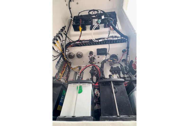 Slide: The Image of 2024 Ocean Runner 34 Center Console electrical system with wiring and battery setup. - 17