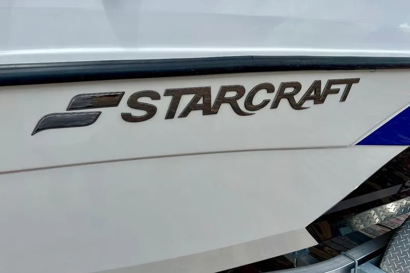 Slide: The Image of 2023 Starcraft SVX 171 OB boat logo on white hull. - 6