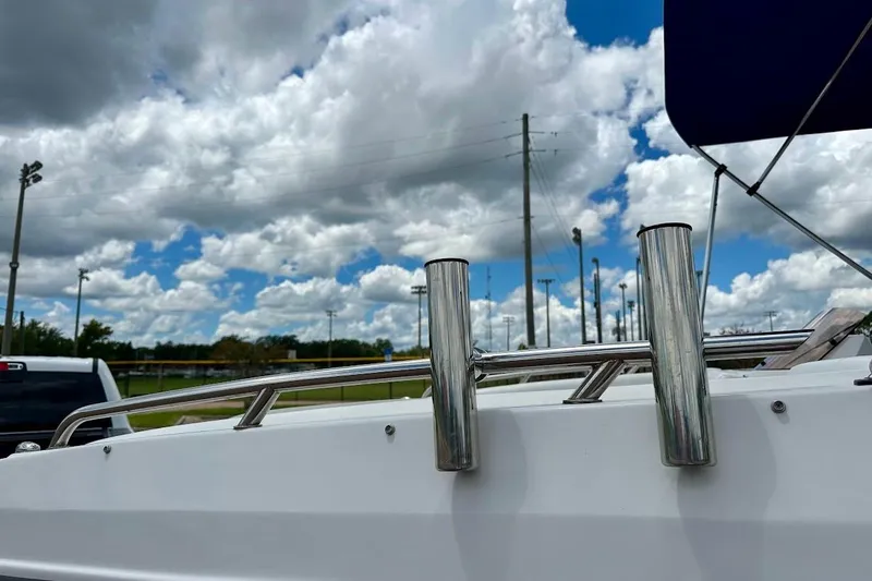 Slide: The Image of 2023 Starcraft SVX 171 OB boat railing under cloudy sky. - 7