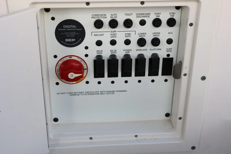 Slide: The Image of Control panel of 2025 Chaparral 2870 SSX boat with switches and digital relay. - 49