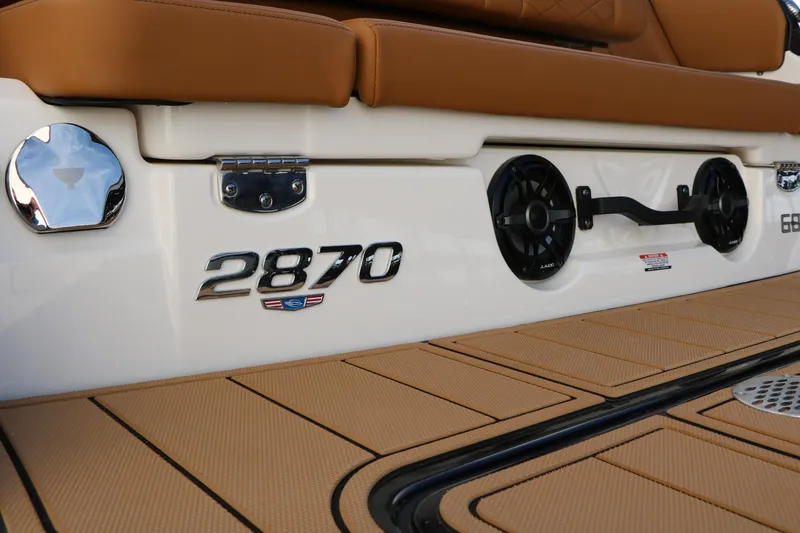 Slide: The Image of 2025 Chaparral 2870 SSX boat deck with speakers and seating. - 50