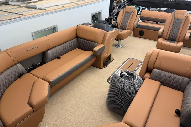 Slide: The Image of Luxurious interior of 2026 Harris Cruiser 230 pontoon boat with plush seating. - 6