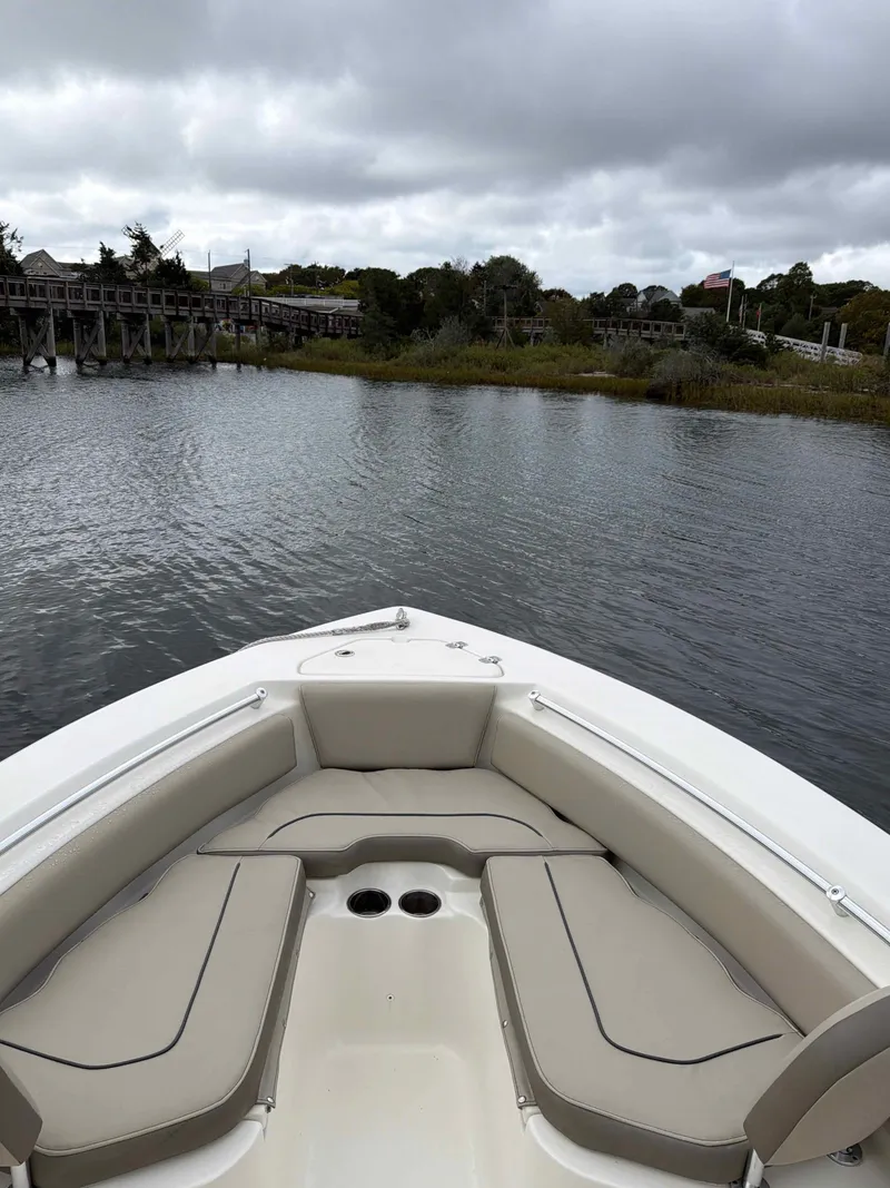 Slide: The Image of Key West 219 FS boat on calm waters, 2023 model. - 8