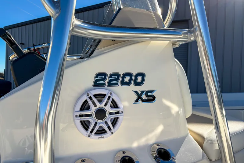 Slide: The Image of 2026 Bulls Bay 2200 XS boat console with speaker and chrome details. - 3