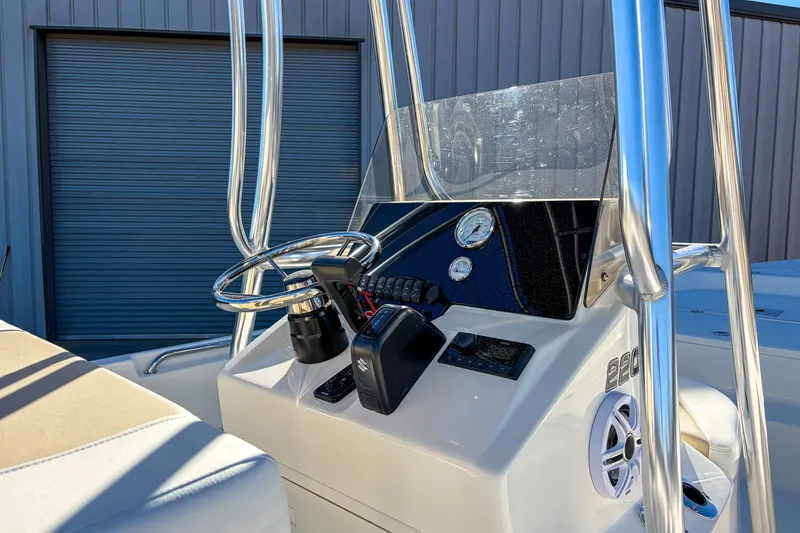 Slide: The Image of 2026 Bulls Bay 2200 XS boat console with steering wheel and gauges. - 6
