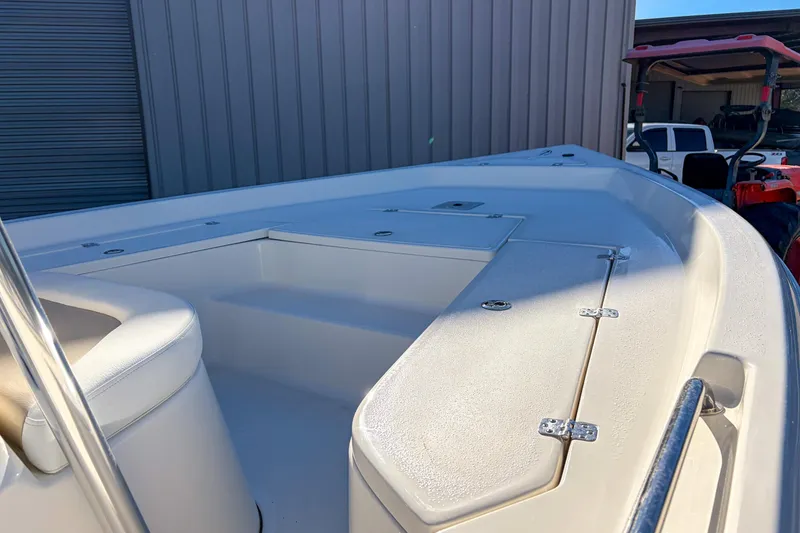 Slide: The Image of 2026 Bulls Bay 2200 XS boat interior with seating and storage compartments. - 7