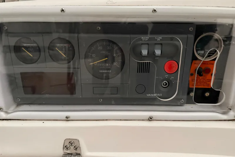 Slide: The Image of Control panel of a 2005 Hunter 46LE sailboat with Yanmar engine gauges. - 9