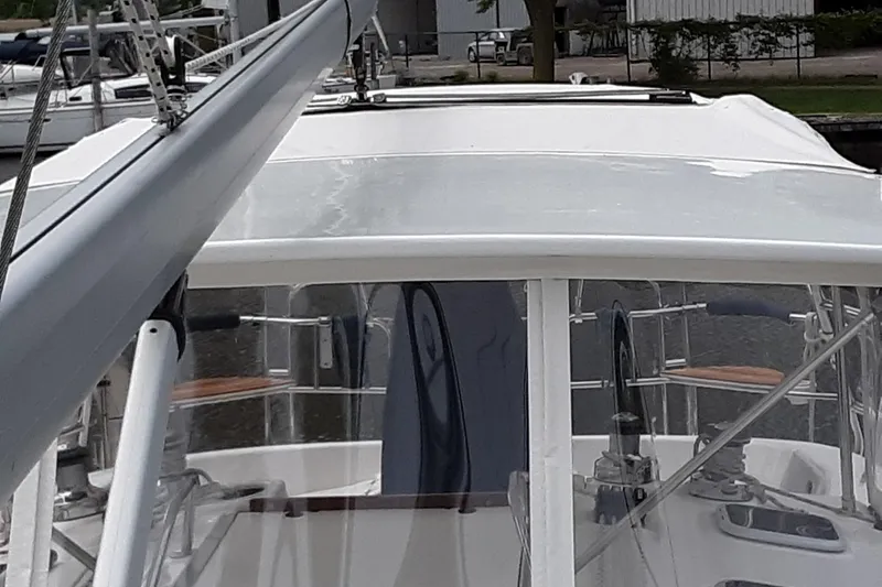 Slide: The Image of 2005 Hunter 46LE sailboat cockpit with visible rigging and equipment. - 6