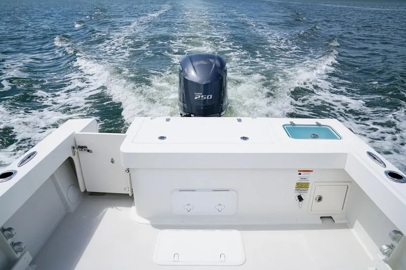 Slide: The Image of Manufacturer Provided Image: 2019 Parker 2320 Sport Cabin boat with Yamaha 250 outboard motor on open water. - 24