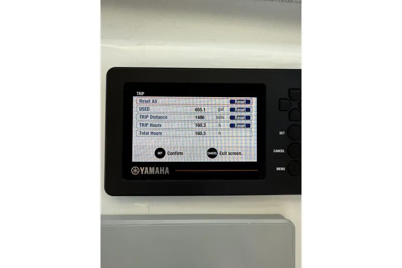 Slide: The Image of Close-up of a 2019 Parker 2320 Sport Cabin boat engine component. - 9