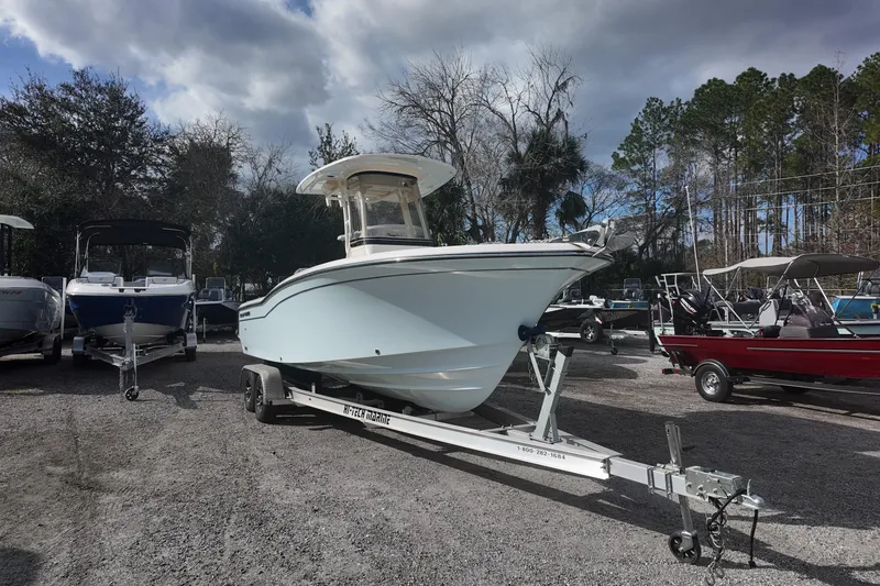 Slide: The Image of 2023 Grady White Fisherman 236 boat on trailer in outdoor lot. - 2