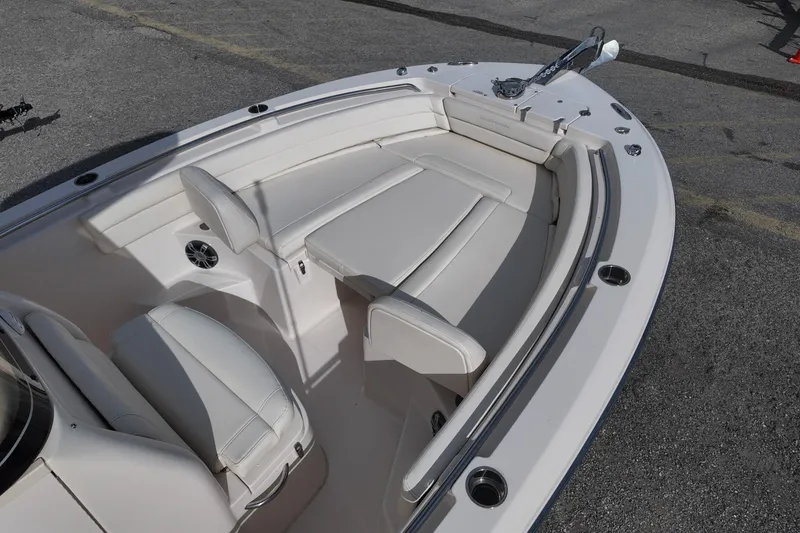 Slide: The Image of 2023 Grady White Fisherman 236 boat interior with cushioned seating and sleek design. - 8