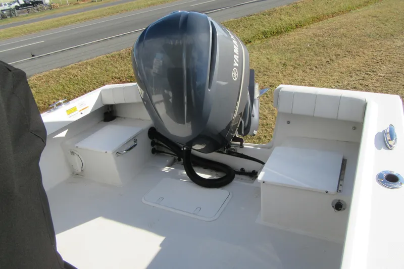 Slide: The Image of 2022 Parker 2300 Special Edition boat with Yamaha outboard motor, rear deck view. - 13