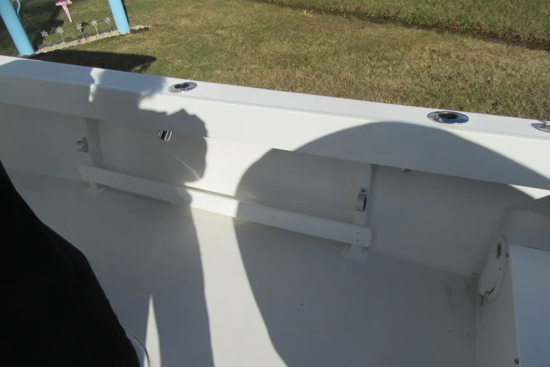 Slide: The Image of Interior view of 2022 Parker 2300 Special Edition boat, showing clean white deck. - 14