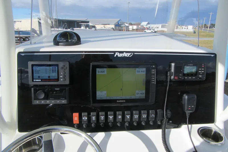 Slide: The Image of Control panel of 2022 Parker 2300 Special Edition boat with Garmin and Yamaha displays. - 21