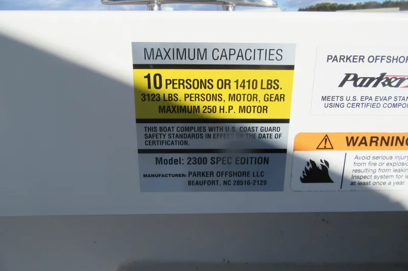 Slide: The Image of Capacity label on 2022 Parker 2300 Special Edition boat, maximum 10 persons or 1410 lbs. - 26