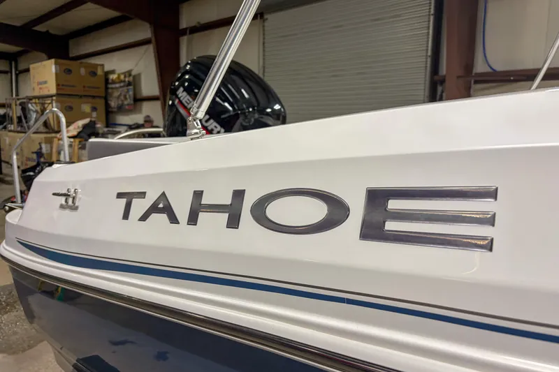 Slide: The Image of 2023 Tahoe 185 S boat in a warehouse setting. - 4