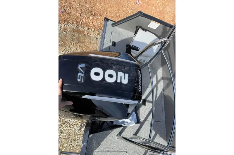 Slide: The Image of 2026 Lowe Sport Deck 224 with Mercury V6 engine, viewed from above. - 7