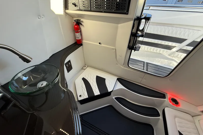 Slide: The Image of Luxurious interior of 2021 MTI 42V boat with modern sink and seating. - 12