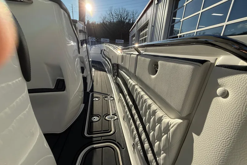 Slide: The Image of Interior view of a 2021 MTI 42V boat, featuring luxurious seating and sleek design. - 19