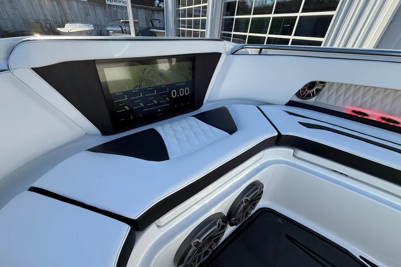 Slide: The Image of 2021 MTI 42V boat interior with GPS display and premium seating. - 21