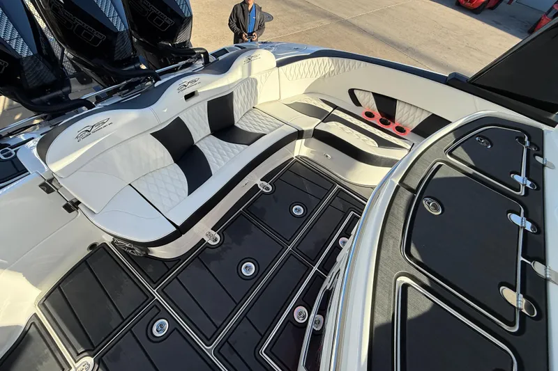 Slide: The Image of Luxurious interior of 2021 MTI 42V boat with sleek seating and storage compartments. - 26