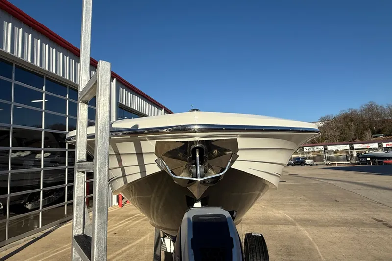 Slide: The Image of 2021 MTI 42V boat front view at a marina under clear blue sky. - 6