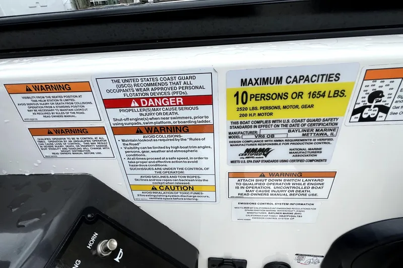 Slide: The Image of 2025 Bayliner VR6 Bowrider OB capacity and safety warnings, accommodating 10 persons or 1654 lbs. - 9