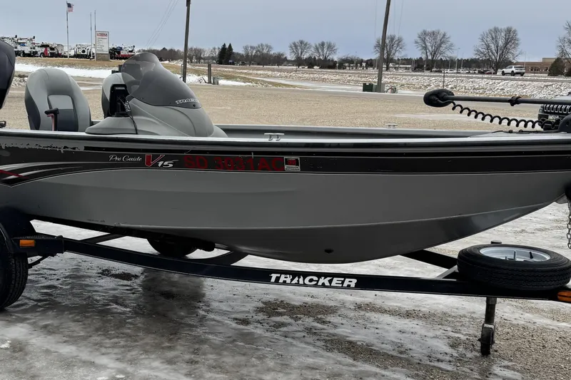 Slide: The Image of 2010 Tracker Pro Guide V-15 SC boat on trailer in outdoor setting. - 4