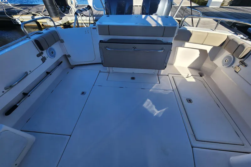 Slide: The Image of 2021 Cutwater C-32 CB boat interior with spacious seating and storage compartments. - 14