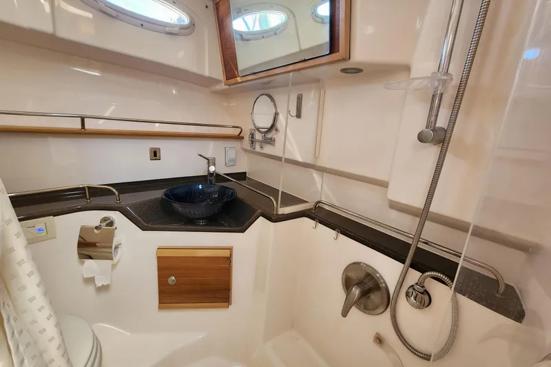 Slide: The Image of 2021 Cutwater C-32 CB yacht bathroom with modern fixtures and elegant design. - 23