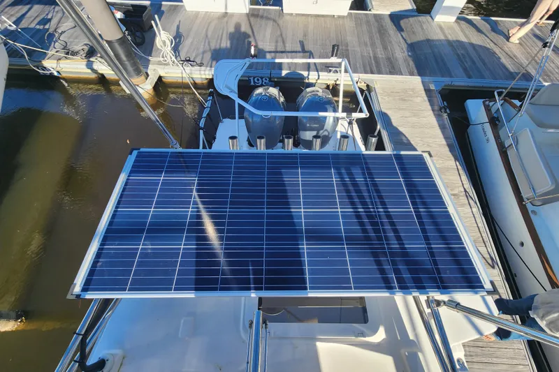 Slide: The Image of 2021 Cutwater C-32 CB boat with solar panel at dockside. - 58