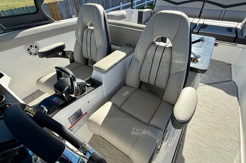 Slide: The Image of Interior of 2026 Monterey Elite 30 OB with luxurious seating. - 11