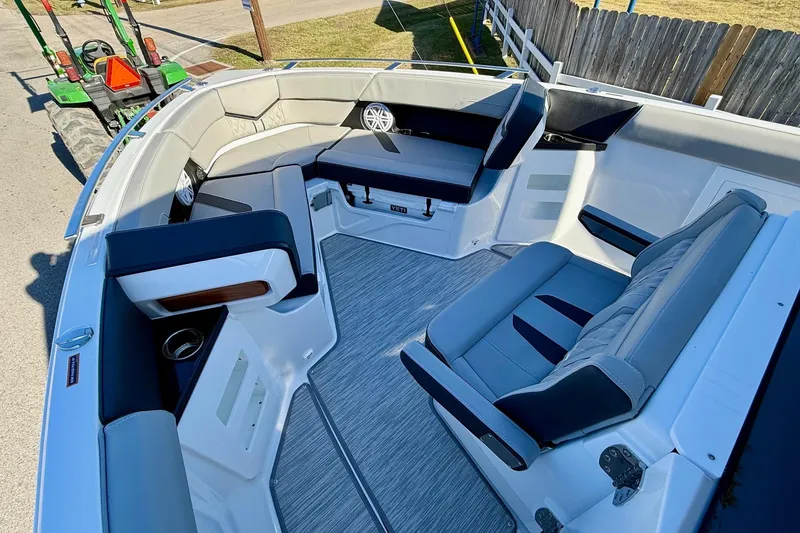 Slide: The Image of Interior of 2026 Monterey Elite 30 OB with luxurious seating. - 17