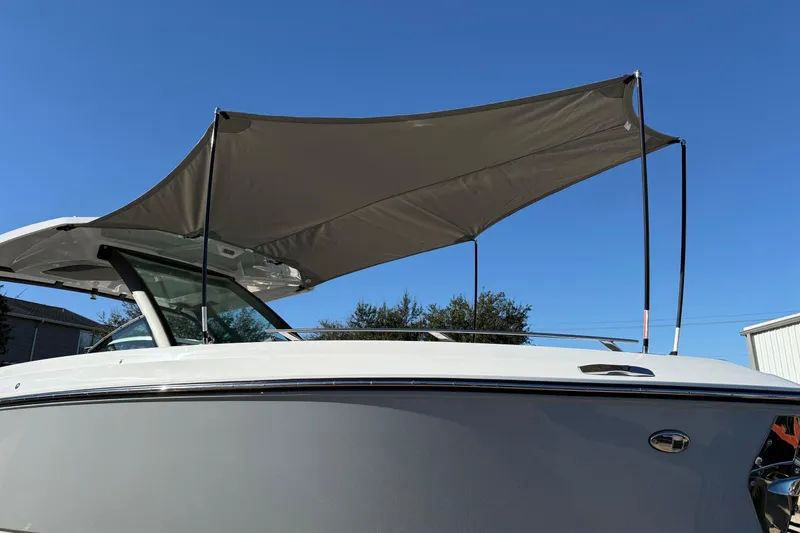 Slide: The Image of 2026 Monterey Elite 30 OB with sunshade, side view. - 23