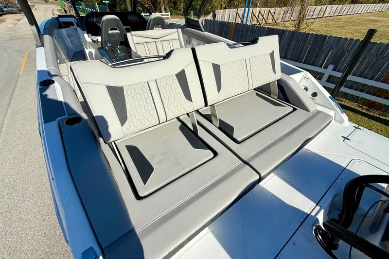 Slide: The Image of 2026 Monterey Elite 30 OB with luxurious outdoor seating. - 8