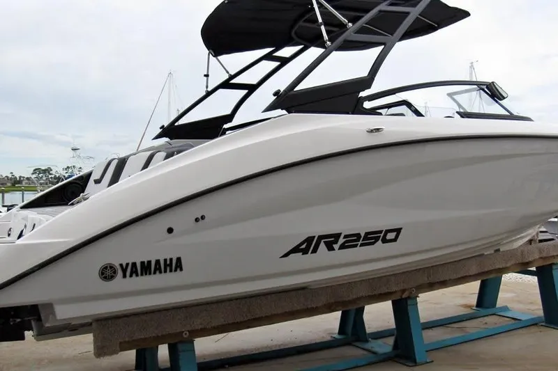 The Image of 2025 Yamaha Boats AR250 on display, featuring sleek design and modern architecture. - 0