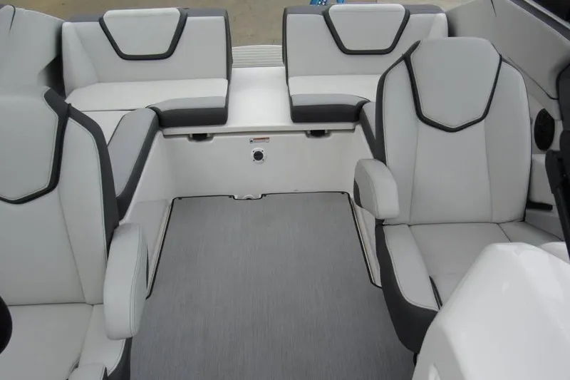 Slide: The Image of 2025 Yamaha Boats AR250 interior with modern seating and sleek design. - 7