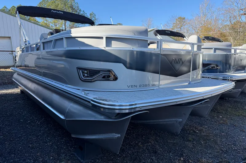 The Image of 2026 Avalon VENTURE QUAD LOUNGER pontoon boat, sleek design, parked outdoors. - 0