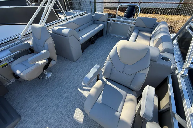 Slide: The Image of 2026 Avalon VENTURE QUAD LOUNGER interior with luxurious gray seating and spacious layout. - 7