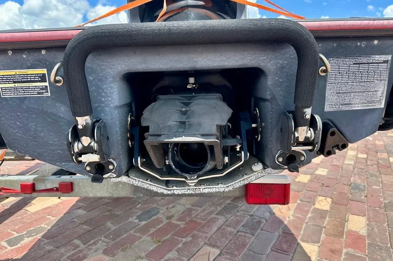 Slide: The Image of Rear view of a 2006 Sea-Doo RXT jet ski on a brick surface. - 7