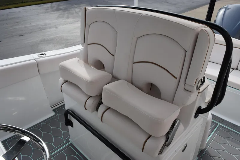 Slide: The Image of 2021 Sea Hunt Ultra 255 SE boat with comfortable dual seating and stylish interior design. - 14