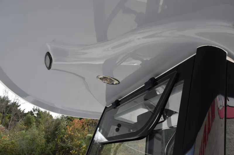 Slide: The Image of 2021 Sea Hunt Ultra 255 SE boat detail, featuring sleek design and modern fixtures. - 17