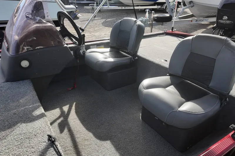 Slide: The Image of 2020 Bass Tracker Classic XL boat interior with two gray seats. - 10