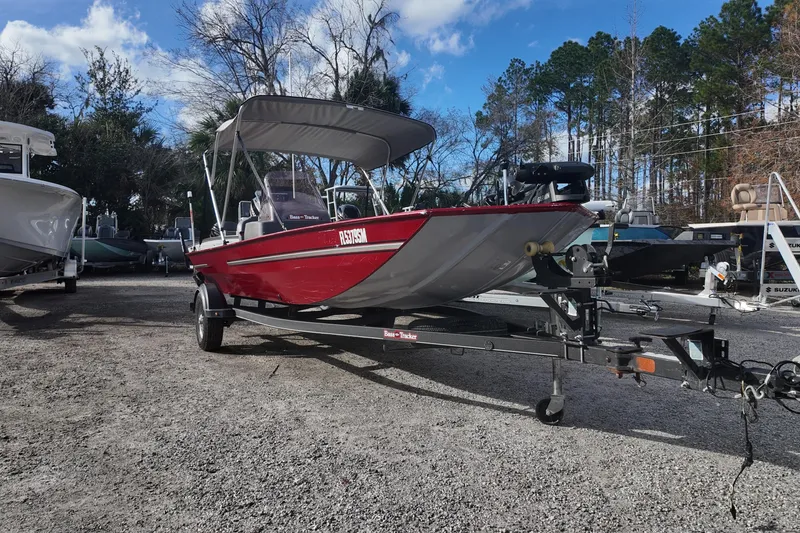 Slide: The Image of 2020 Bass Tracker Classic XL boat on trailer, parked outdoors. - 2