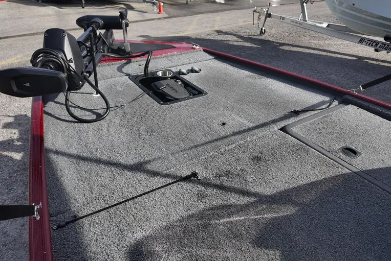 Slide: The Image of 2020 Bass Tracker Classic XL boat deck with trolling motor and storage compartments. - 9