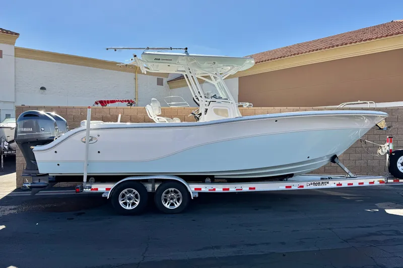 The Image of 2021 Sea Fox 268 Commander boat on trailer, parked outdoors. - 0