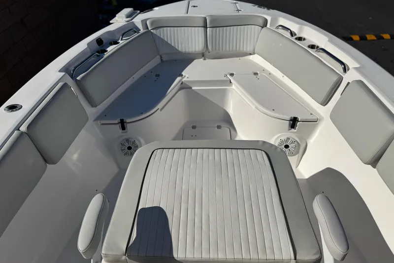 Slide: The Image of 2021 Sea Fox 268 Commander boat interior with cushioned seating and storage compartments. - 14